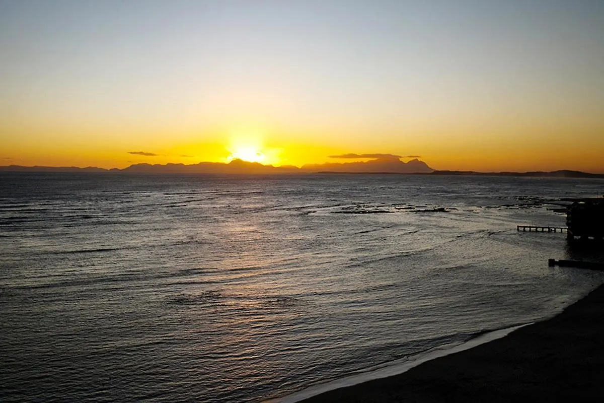 Seaside Sunsets Daire Strand